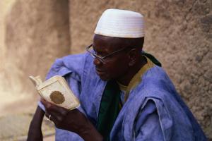 Man reading Koran
